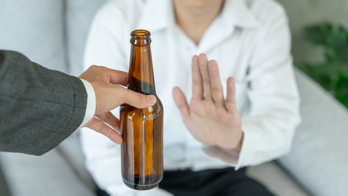 To refuse the beer
