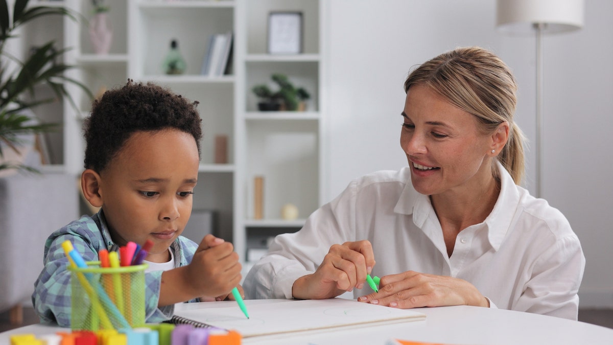 boy with specialist in pediatrics