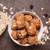 High protein energy without healthy vessels on the plate next to the rolled oats and nuts