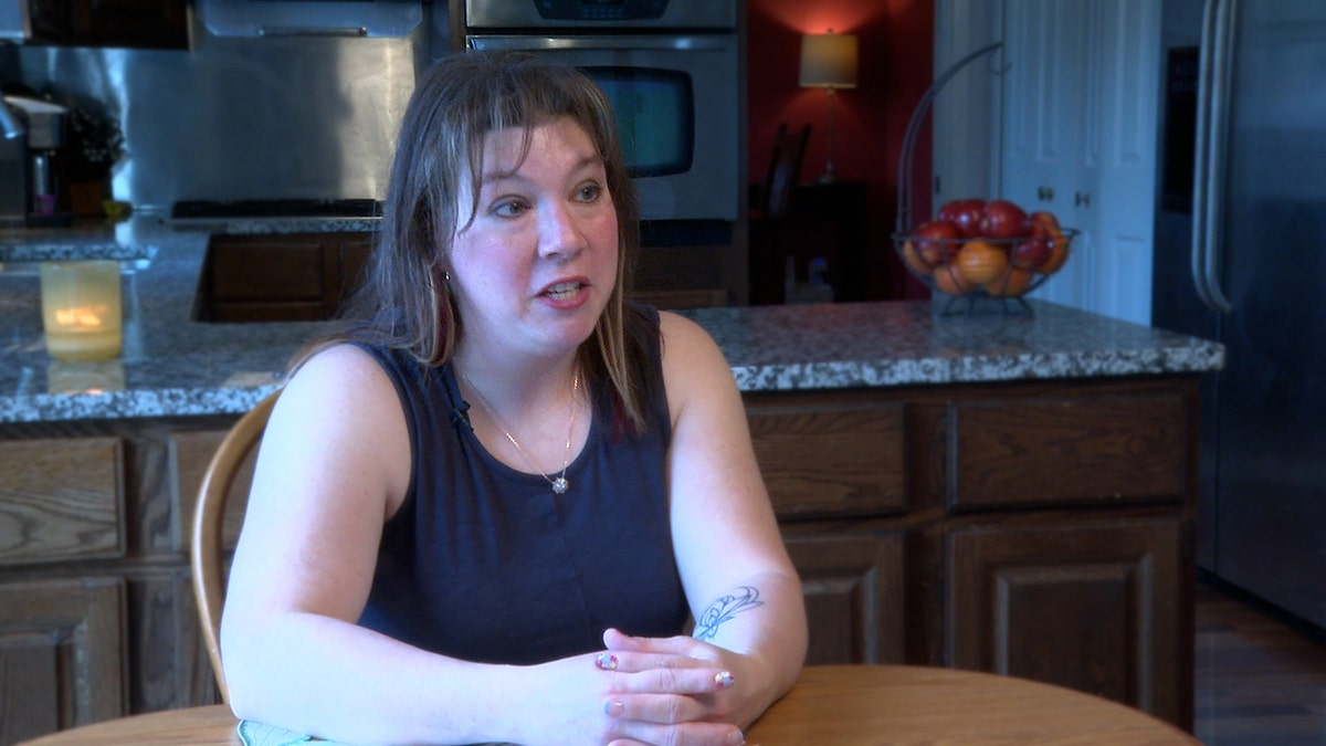 Lauren Koltcz, 45, by North Royalton, Ohio, noticed a brown line in the left miniature, but thought it was caused by a deficiency of vitamins.